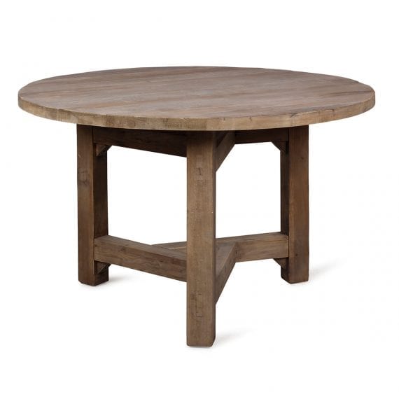 Table ronde en bois de brasserie.