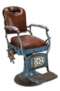 Vieille chaise de barbier style vintage