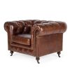 Individual armchair in brown leather.