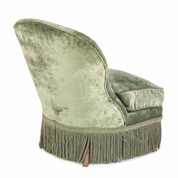 Retro style armchairs. Velvet model in green tone.