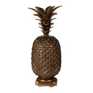 Golden pineapple-shaped table lamp.