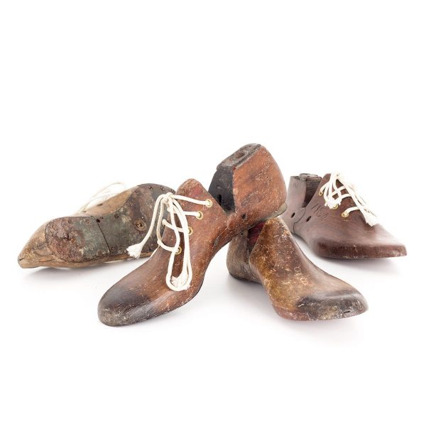 Antique shoe lasts to decorate in shops and stores.