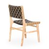 Chair in synthetic rattan.