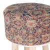 High stool upholstered with patterns.