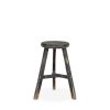 Round wooden stool.