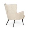 Beige upholstered armchairs.