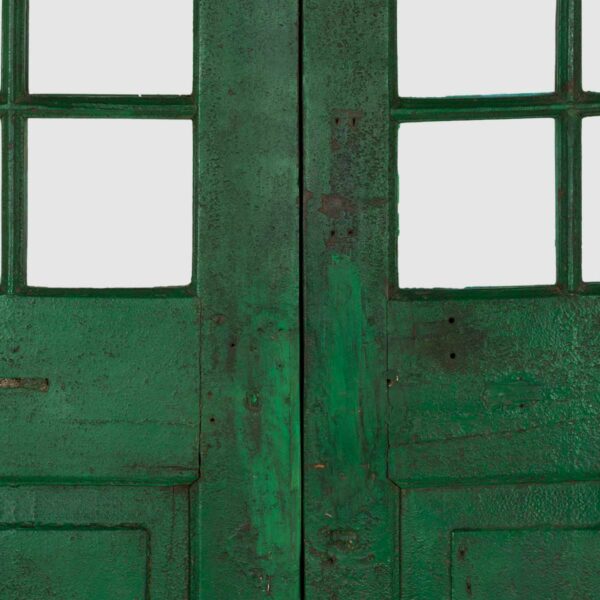 Antique green wood doors.