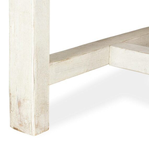 Large tables in white wood.