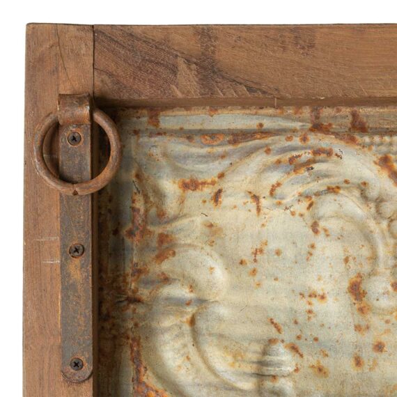 Panel decorativo vintage en metal.