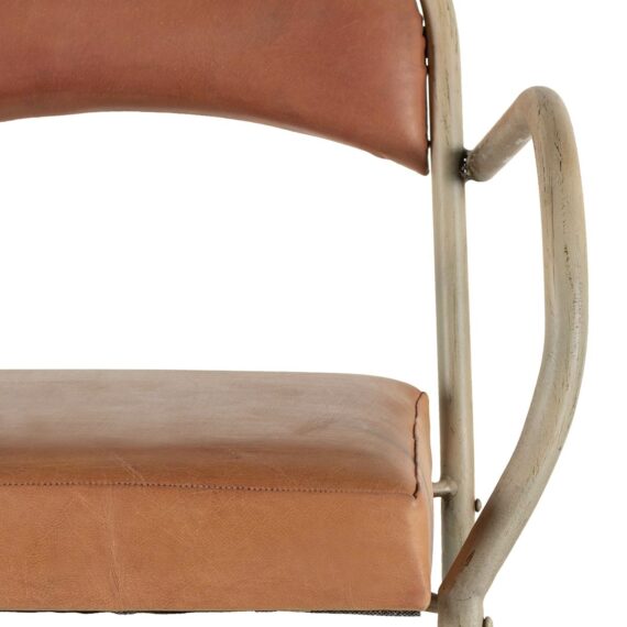 Upholstered chair with arms.