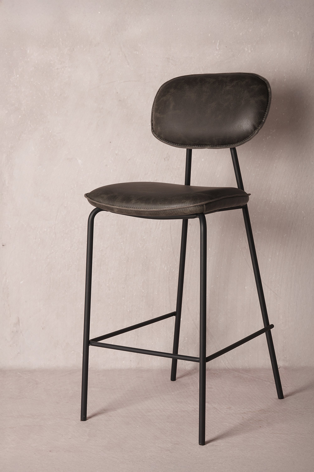 Leatherette upholstered stools.