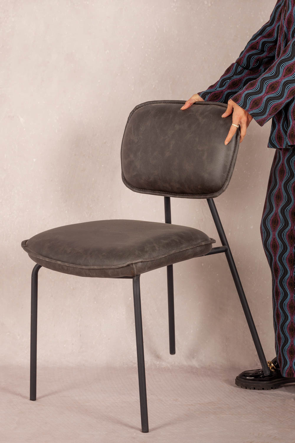 Leatherette upholstered seating.