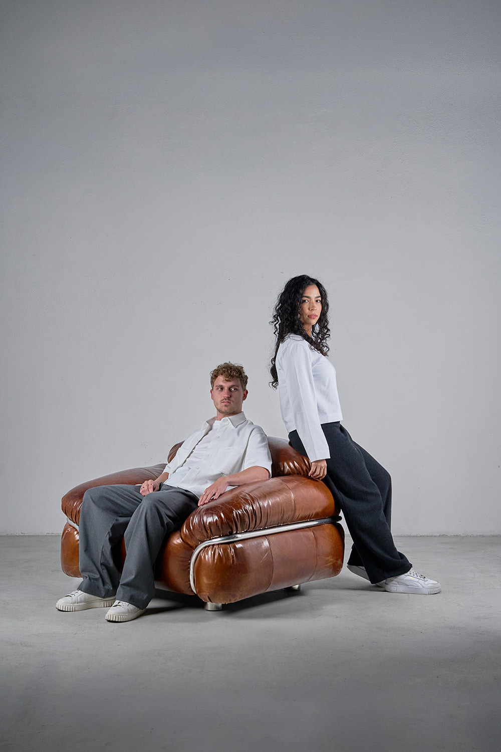 Armchairs and sofas.